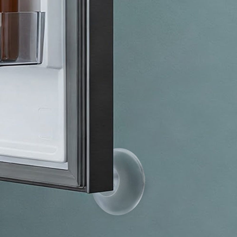 Fridge door edge meeting a clear protector on a teal wall